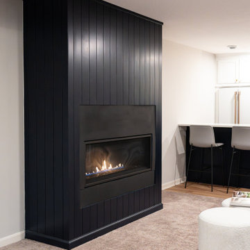 Bold Basement Finish — Linear Gas Fireplace, Wet Bar & Cafe Appliance Suite