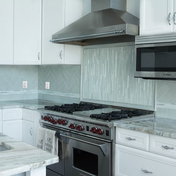 Glass and handmade tiles backsplash