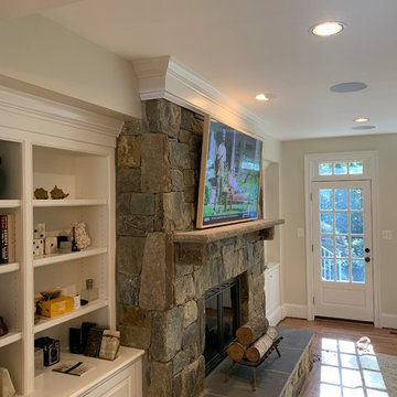 Samsung 65' FRAME Art Panel over Stone Fireplace with surround system