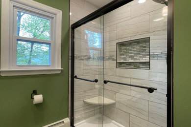Example of a mid-sized minimalist master single-sink bathroom design in Newark with a two-piece toilet and gray countertops