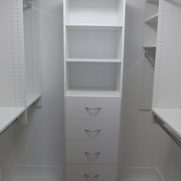 Small walk-in closet w/shelves, drawers, double and long hanging