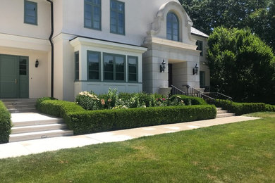 Example of a mid-sized trendy one-story house exterior design in Boston