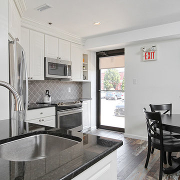 Cherry Hill, NJ: Open Office Kitchen with Diagonal Fridge and Rustic Floors
