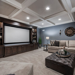 Inspiration for a traditional basement in Columbus with blue walls, carpet and no fireplace.