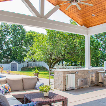 Open Gable Pool House with Fireplace and Grilling Area