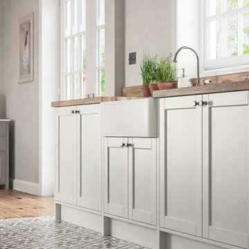 Belfast Sink perched upon Porcelain Cupboards topped with Solid Oak Worktop.