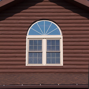 Valders log home with Soft-Lite Windows