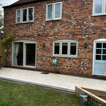 Narrow Porcelain Terrace Between Cottage and Lawn