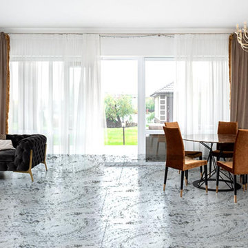 What is better: marble tiles or big marble slabs for flooring?