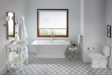 Photo of a bathroom in New York with mosaic tile floors.