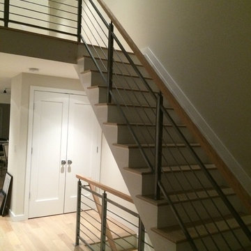 Horizontal railing with wood handrail