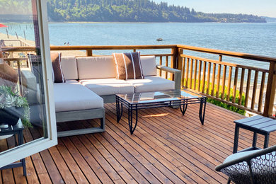 Home design - large coastal home design idea in Seattle