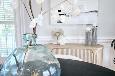 Example of a beach style dining room design in Other