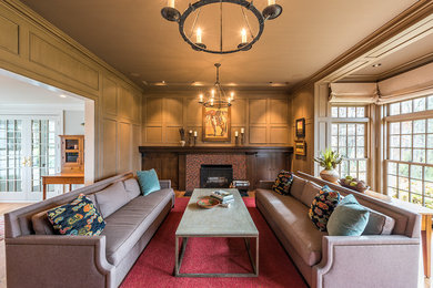 Large elegant open concept and formal medium tone wood floor living room photo in Minneapolis with a standard fireplace, a tile fireplace and beige walls