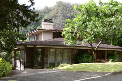 Inspiration for a contemporary wood exterior home remodel in Hawaii