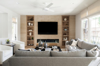Example of a transitional family room design in Los Angeles