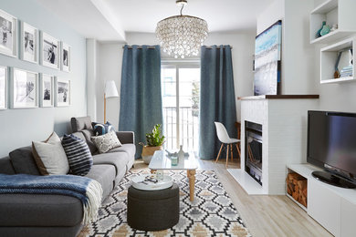 Example of a beach style living room design in Toronto