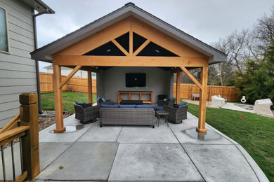 Patio - mid-sized backyard patio idea in Wichita with a gazebo