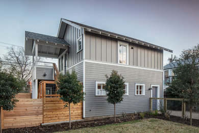 Small craftsman multicolored two-story mixed siding gable roof idea in Austin