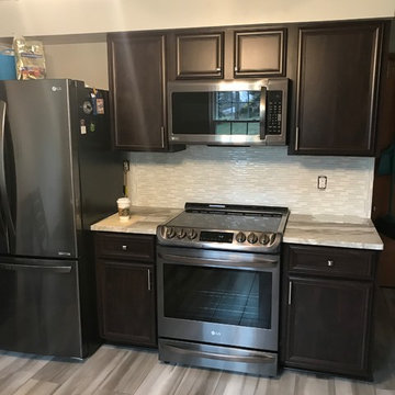 cabinet refacing-------chocolate and new granite and splash