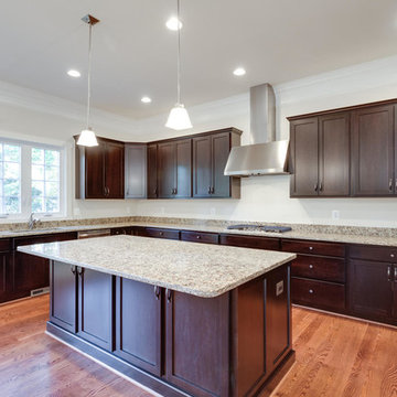 Gourmet Kitchen w/Large Granite Center Island, Dark Cabinetry