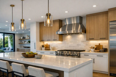 Trendy kitchen photo in Orange County with medium tone wood cabinets, quartz countertops, beige backsplash, ceramic backsplash, stainless steel appliances and an island