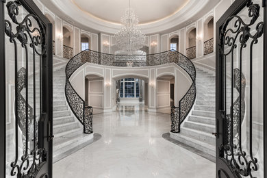 Inspiration for an expansive transitional foyer in Phoenix with white walls, marble floors, a double front door, a black front door and white floor.