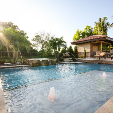Roman/Geometric Pool with Spa & Water Features Including Sun Shelf in Boynton Be