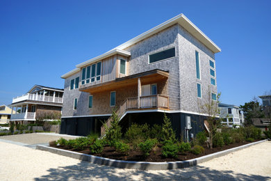 Trendy wood exterior home photo in New York