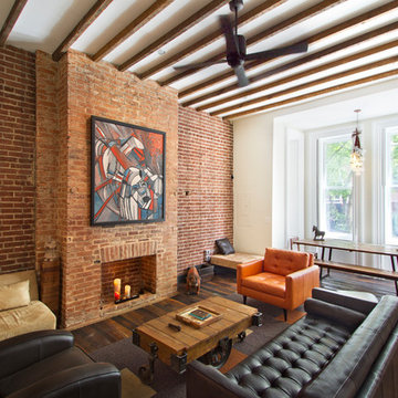 Living and dining with brick fireplace