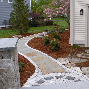 Bluestone Patio with Granite Cobblestone walls