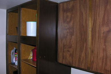 Cabinets go from dark to light in Condominium Kitchen