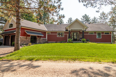 Inspiration for a craftsman one-story house exterior remodel in Other
