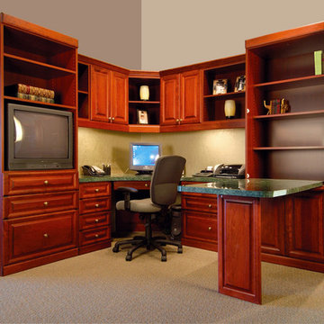 Home office with drop down desk and TV area