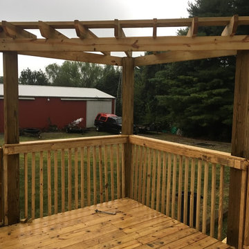 Small deck and decorative pergola; customer request for lattice.