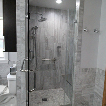 Master Bathroom with dressing table, washer and dryer.