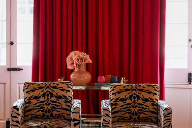 Example of an eclectic living room design in New Orleans