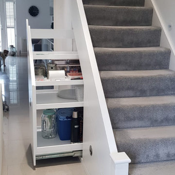 Unde rstairs storage with pull outs