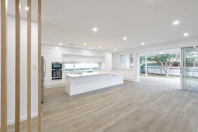 Photo of a contemporary home design in Newcastle - Maitland.