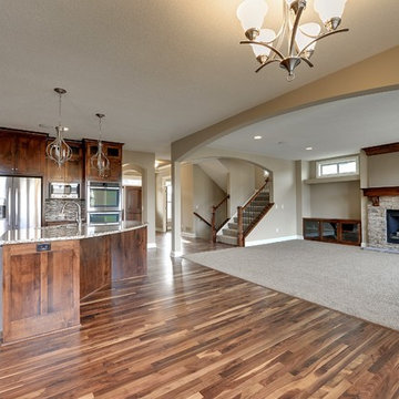 Architectural Designs Exclusive Plan 73352HS - Three Level Craftsman Beauty