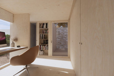 Modern study with plywood flooring, a built-in desk, a wood ceiling, wood walls and feature lighting.