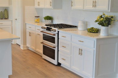 Example of a mid-sized minimalist kitchen design in Columbus