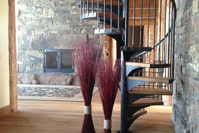 Example of a large mountain style staircase design in Other