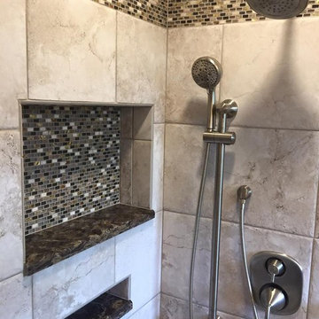 Custom built in Cambria Shelves with glass accents