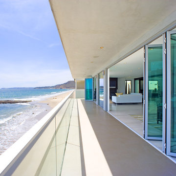 Oceanfront Serenity Framed by NanaWall Glass Walls