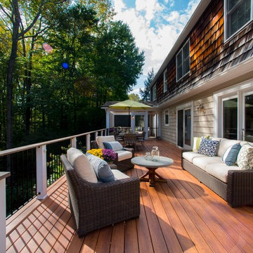 Design Builders mahogany screened porch & Zuri deck in Potomac MD