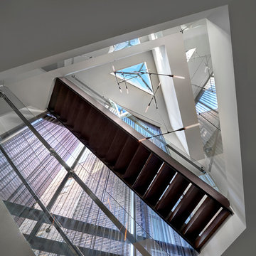 Triple Height Foyer with Skylight Above