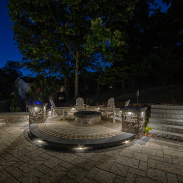 Dual patio with adjoining firepit feature