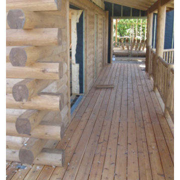 Covered porch with butt-n-pass corners and cedar railing