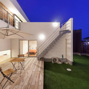 他の地域のコンテンポラリースタイルのおしゃれなデッキの写真